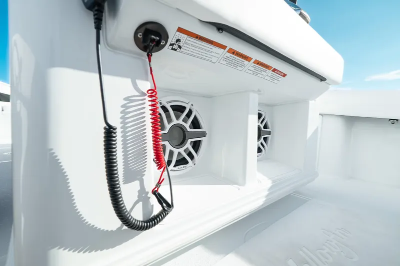 Slide: The Image of 2026 Yellowfin 36 Offshore boat interior with speakers and safety instructions. - 35