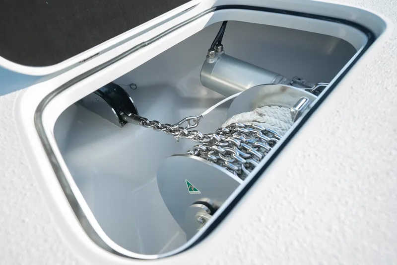 Slide: The Image of Anchor chain compartment of 2026 Yellowfin 36 Offshore boat, showcasing modern design. - 37