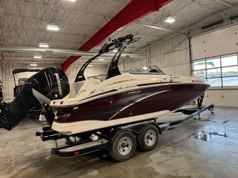 Slide: The Image of 2017 Hurricane SD 2200 DC boat on trailer in indoor storage facility. - 4