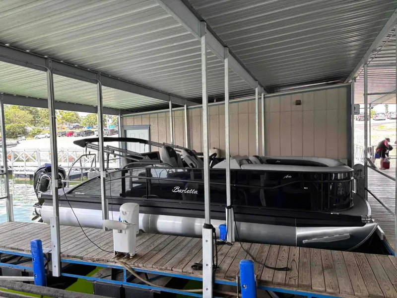 The Image of 2026 Barletta ARIA A22UC pontoon boat in showroom. - 1