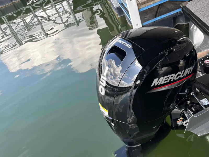 Slide: The Image of 2026 Barletta ARIA A22UC pontoon boat in showroom. - 10