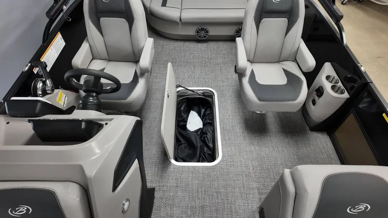 Slide: The Image of Interior of 2026 Barletta ARIA A22UC with gray seats and storage compartment. - 25