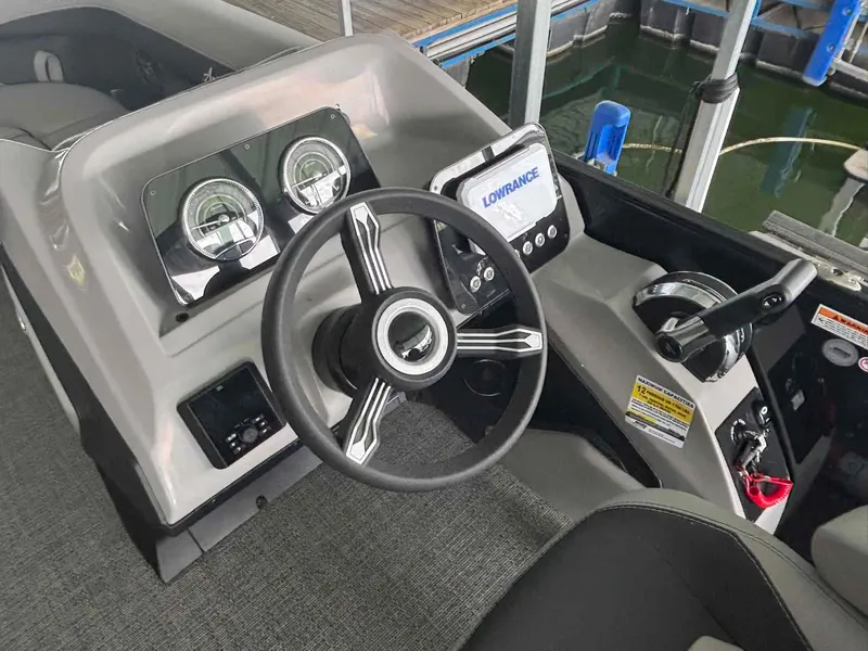 Slide: The Image of 2026 Barletta ARIA A22UC pontoon boat in showroom. - 3