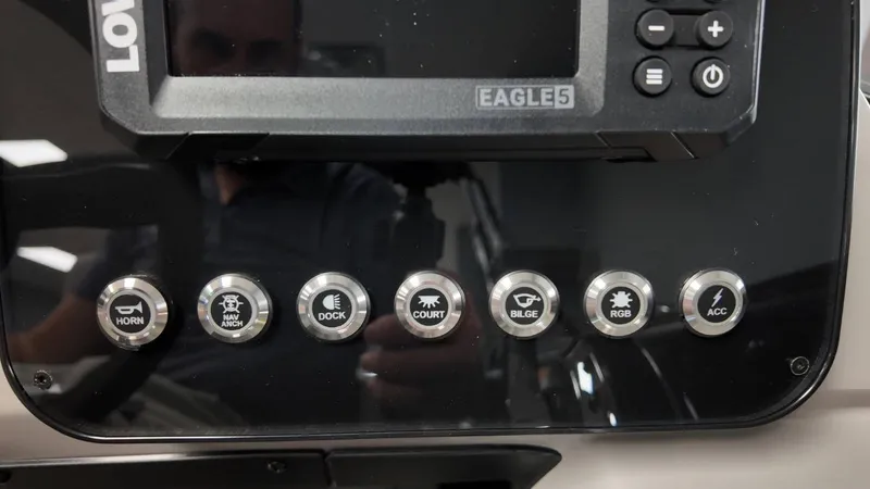 Slide: The Image of Control panel of 2026 Barletta ARIA A22UC with various switches. - 37