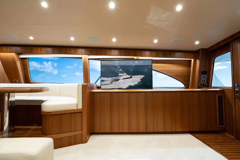 Slide: The Image of Luxurious interior of 2025 Garlington 71' Flybridge yacht with elegant wood finishes and modern amenities. - 12