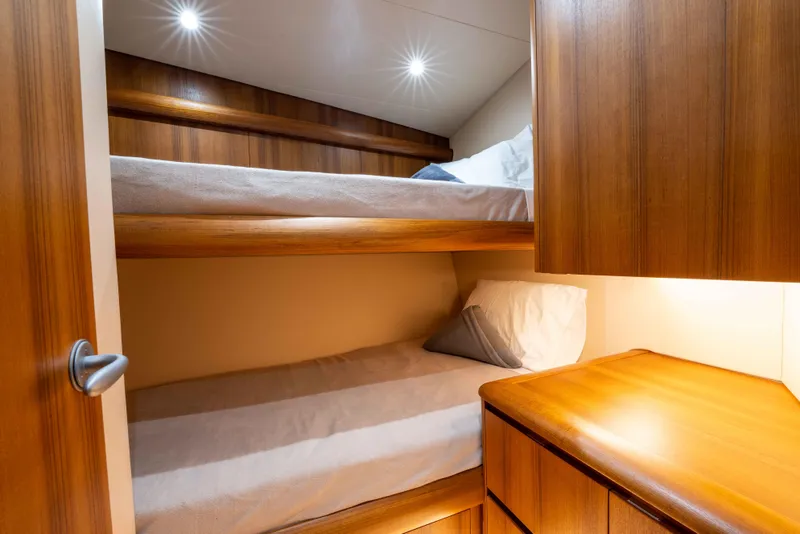 Slide: The Image of Cozy wooden bunk beds in 2025 Garlington 71' Flybridge yacht cabin. - 17