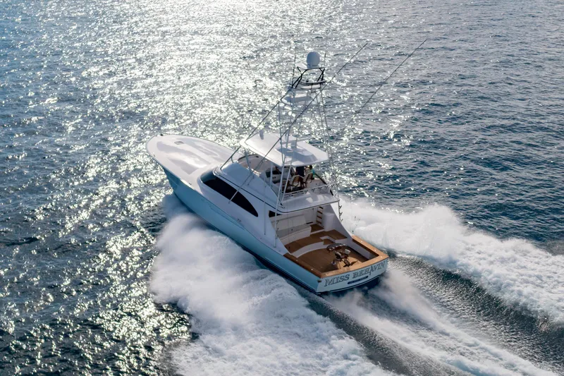 Slide: The Image of Garlington 71' Flybridge yacht cruising on open water, 2025 model. - 3