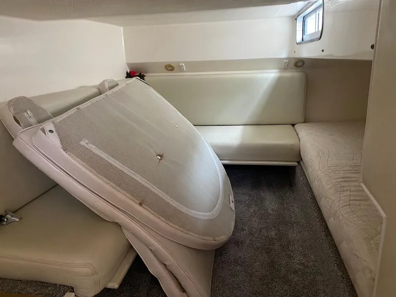 Slide: The Image of Interior cabin of 2001 Wellcraft 45 Excalibur with seating and cushions. - 15