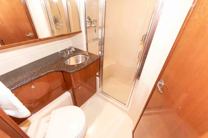 Slide: The Image of Luxurious bathroom in 2006 Meridian 341 Sedan yacht with shower and sink. - 21