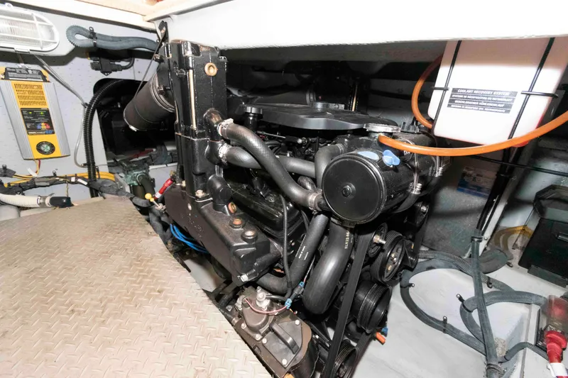 Slide: The Image of Engine room of a 2006 Meridian 341 Sedan, showcasing mechanical components and systems. - 23