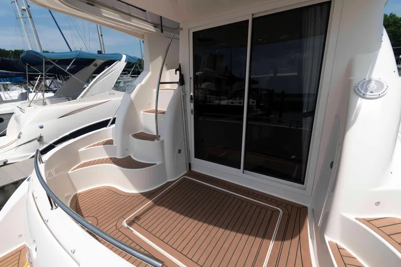 Slide: The Image of 2006 Meridian 341 Sedan yacht with teak deck and sliding glass doors. - 4