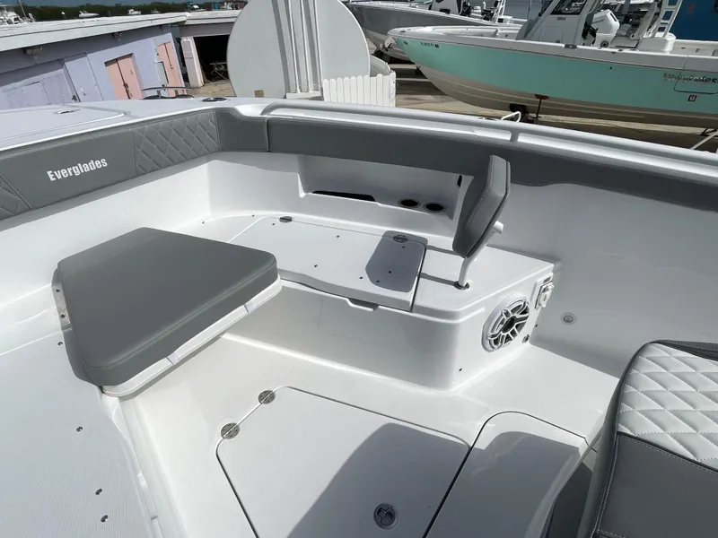 Slide: The Image of 2026 Everglades 375cc boat interior with seating and speaker system. - 13