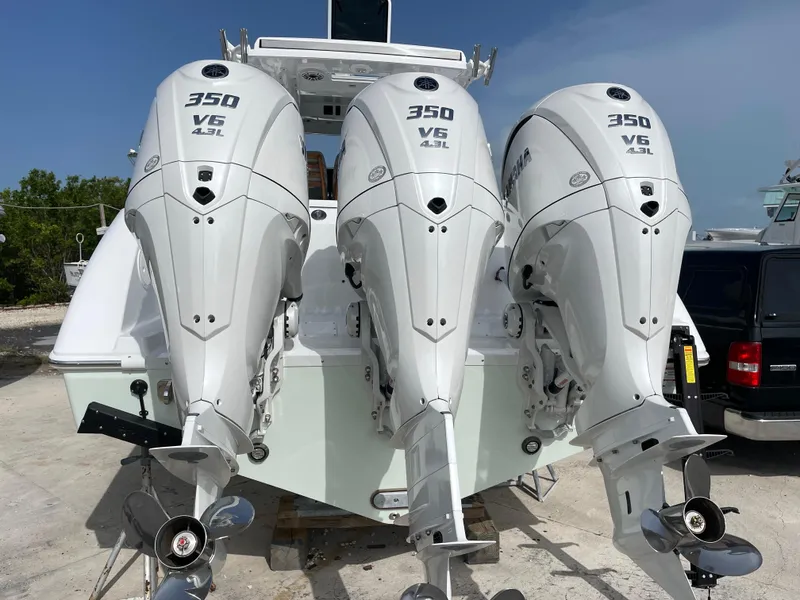 Slide: The Image of Triple 350 V6 outboard engines on a 2026 Everglades 375cc boat. - 5