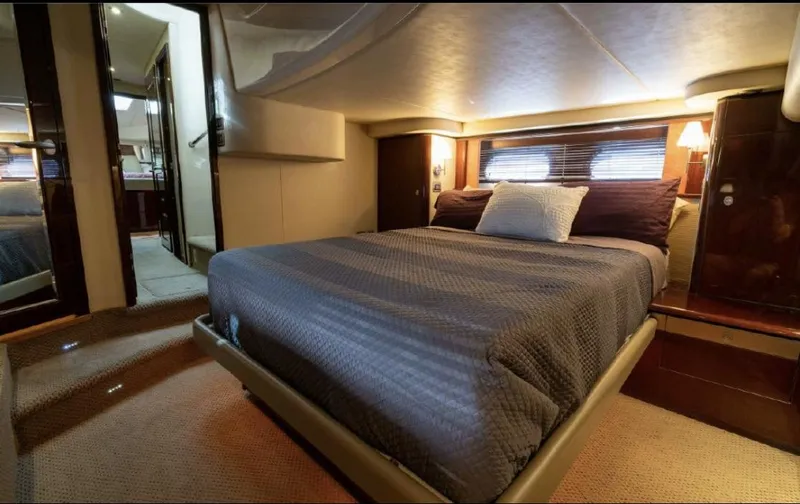 Slide: The Image of Luxurious bedroom interior of 2008 Sea Ray 58 Sedan Bridge yacht. - 40