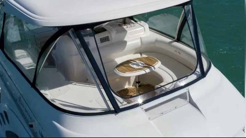 Slide: The Image of 2008 Sea Ray 58 Sedan Bridge yacht with spacious cockpit and elegant seating area. - 5
