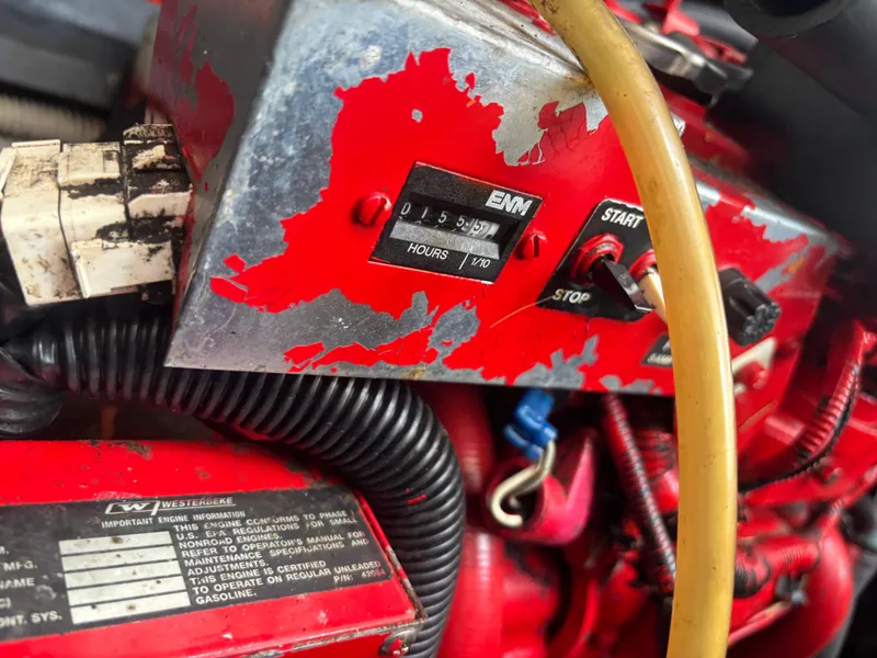 Slide: The Image of Close-up of a 2000 Sea Ray 310 Sundancer engine control panel with hour meter. - 17
