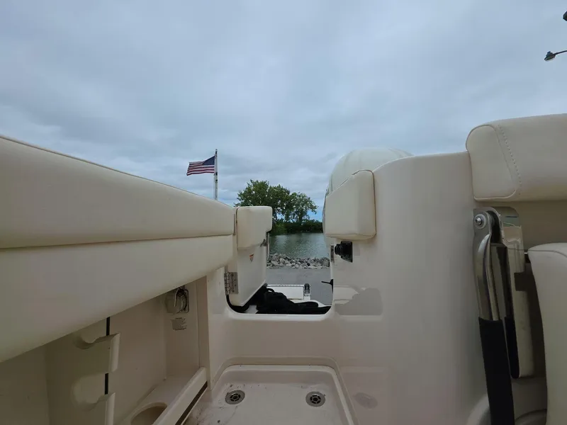 Slide: The Image of 2024 Grady-White Marlin 300 boat interior with American flag in background. - 20