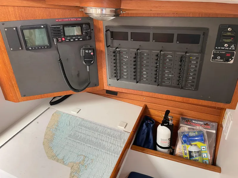 Slide: The Image of Navigation and control panel inside a 1994 J Boats J 40 sailboat. - 14