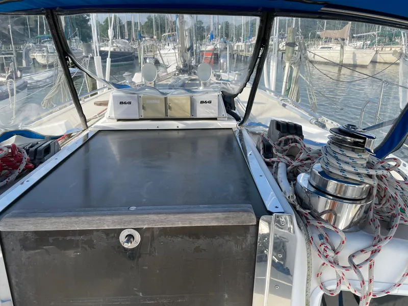 Slide: The Image of Cockpit of 1994 J Boats J 40 sailboat with ropes and winch, docked at marina. - 9