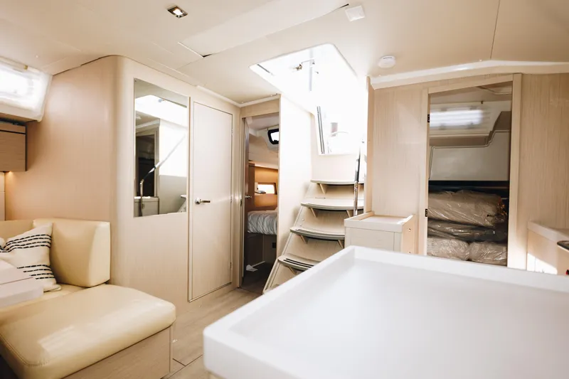 Slide: The Image of 2024 Beneteau Oceanis 46.1 interior with modern design and spacious layout. - 11