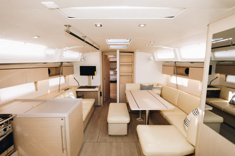 Slide: The Image of Luxurious interior of 2024 Beneteau Oceanis 46.1 yacht, featuring modern design and spacious seating. - 8