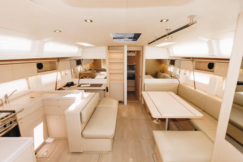 Slide: The Image of Luxurious interior of 2024 Beneteau Oceanis 51.1 yacht, featuring modern design and spacious seating. - 6