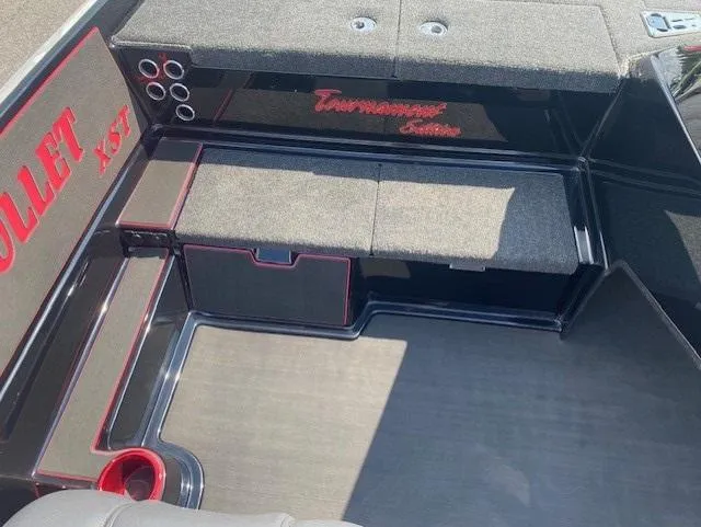 Slide: The Image of 2026 Bullet 21XST boat interior with storage and seating, featuring "Tournament Edition" branding. - 12