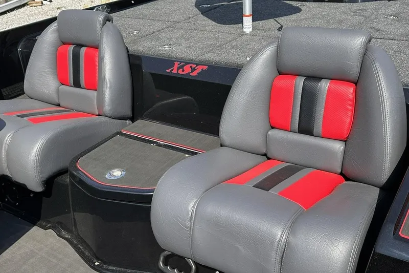 Slide: The Image of 2026 Bullet 21XST boat seats with gray and red upholstery, featuring sleek design. - 16