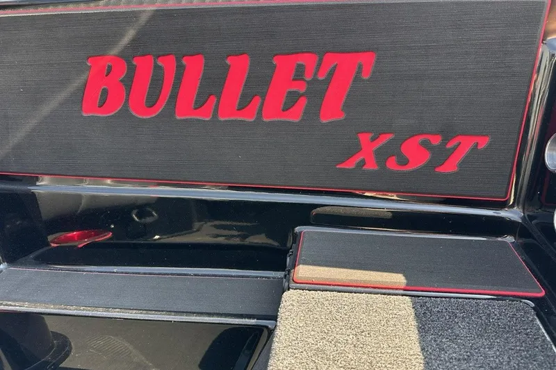 Slide: The Image of Bullet 21XST 2026 model logo in bold red lettering on black background. - 18