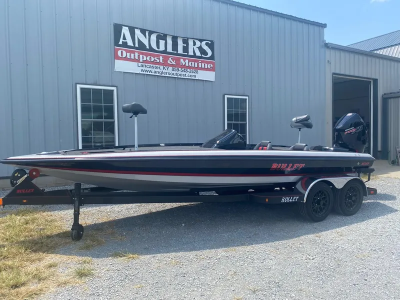 Slide: The Image of 2026 Bullet 21XST boat at Anglers Outpost & Marine dealership. - 4