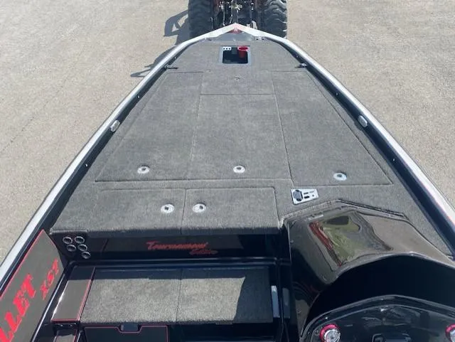 Slide: The Image of 2026 Bullet 21XST boat deck with carpeted surface and storage compartments. - 8