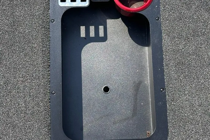 Slide: The Image of 2026 Bullet 21XST boat dashboard with cup holder and control panel. - 9