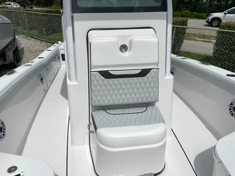 Slide: The Image of 2026 Blackfin 262 HB boat interior with cushioned seating and modern design. - 14
