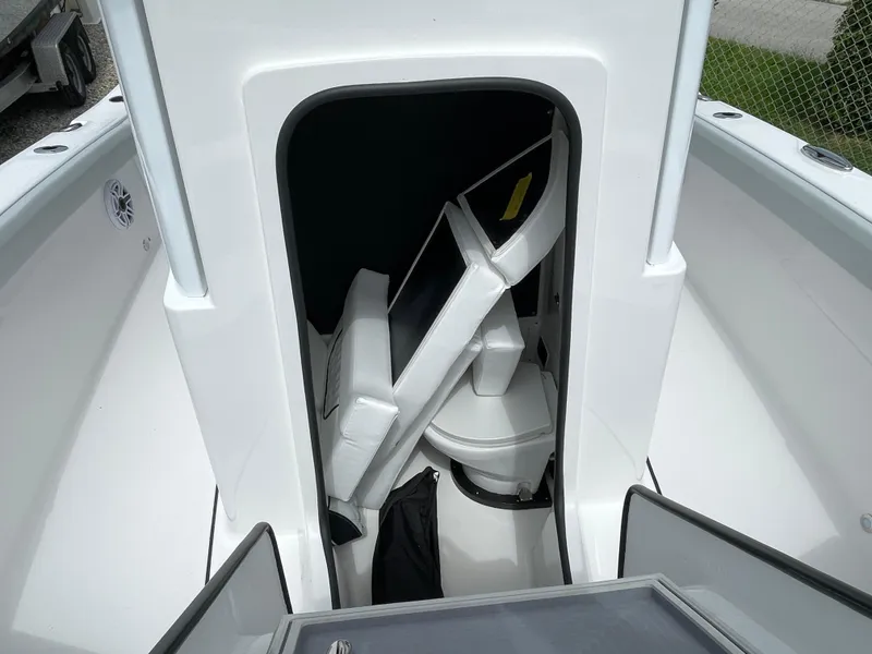 Slide: The Image of 2026 Blackfin 262 HB boat interior with seating and storage area. - 15