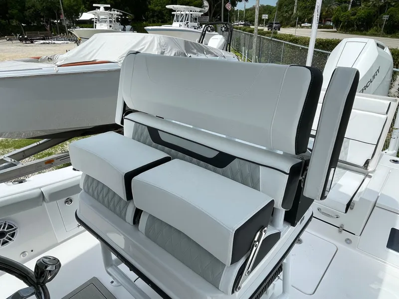 Slide: The Image of 2026 Blackfin 262 HB boat interior with modern seating and sleek design. - 25