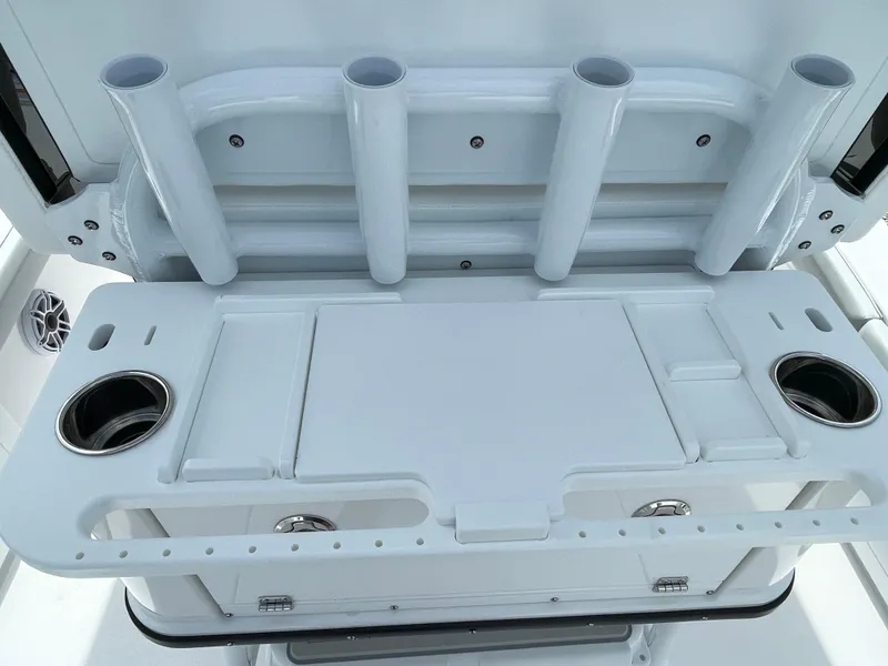 Slide: The Image of 2026 Blackfin 262 HB boat console with rod holders and cup holders. - 28