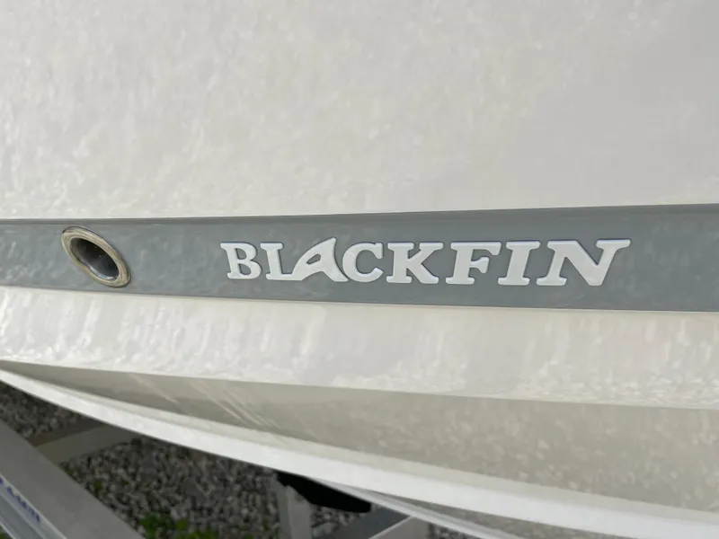 Slide: The Image of 2026 Blackfin 262 HB boat logo on hull, close-up view. - 3