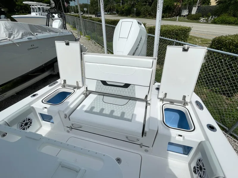 Slide: The Image of 2026 Blackfin 262 HB boat interior with seating and storage compartments. - 33