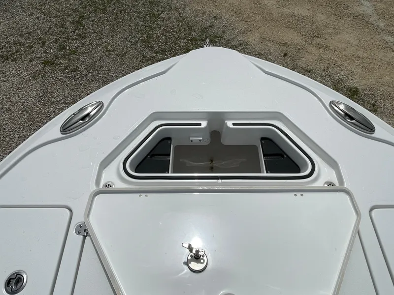 Slide: The Image of 2026 Blackfin 262 HB boat deck with storage compartment and cleats. - 7