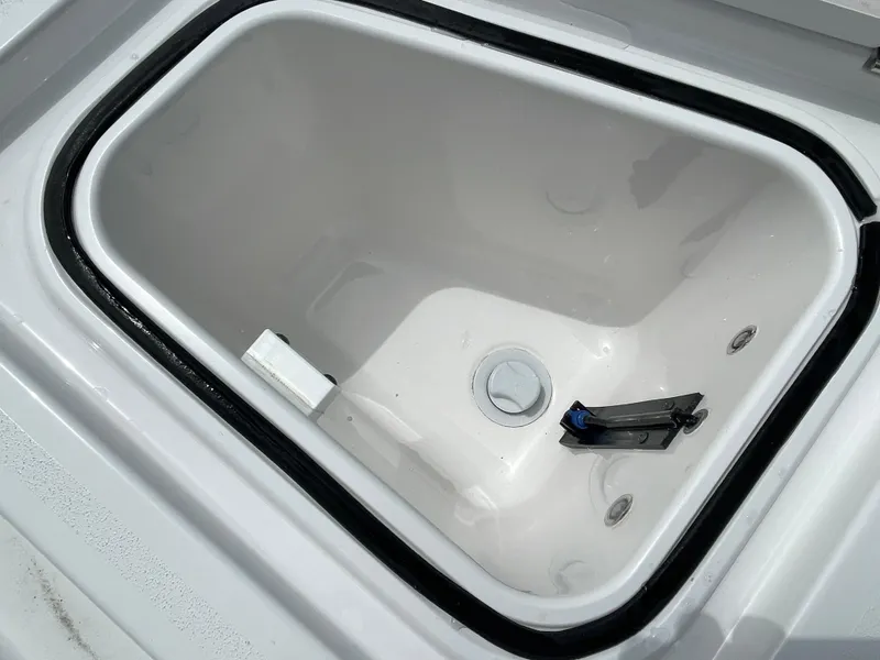 Slide: The Image of Open storage compartment on 2026 Blackfin 262 HB boat. - 8