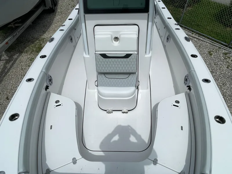 Slide: The Image of 2026 Blackfin 262 HB boat interior with seating and storage compartments. - 9
