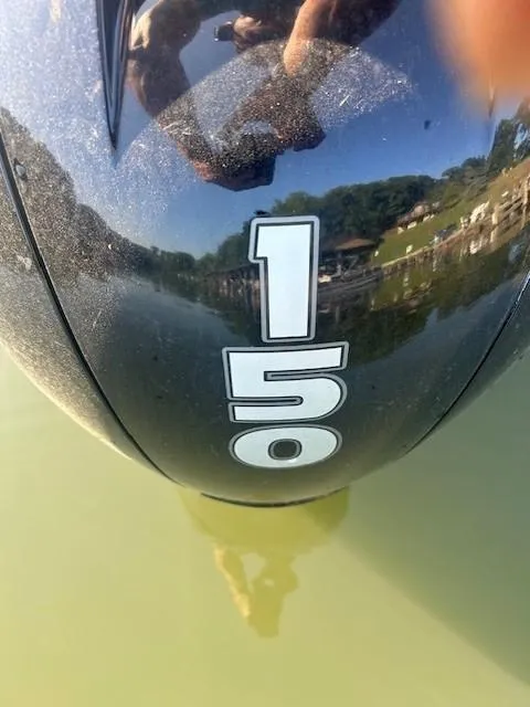 Slide: The Image of Outboard motor with "150" label on a 2022 Sun Tracker Party Barge 22 XP3. - 20