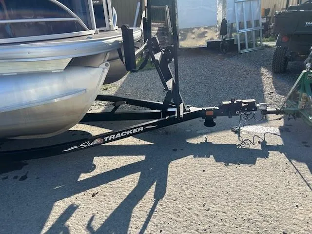 Slide: The Image of 2022 Sun Tracker Party Barge 22 XP3 trailer hitch in a sunny outdoor setting. - 26