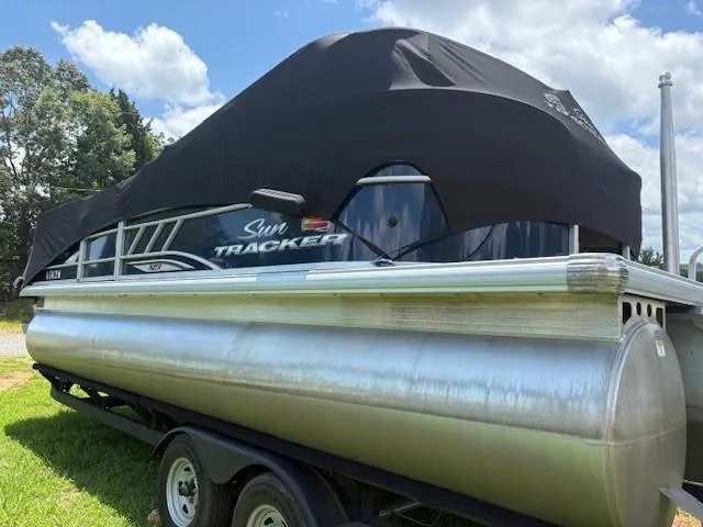 Slide: The Image of 2022 Sun Tracker Party Barge 22 XP3 pontoon boat with cover on trailer. - 3