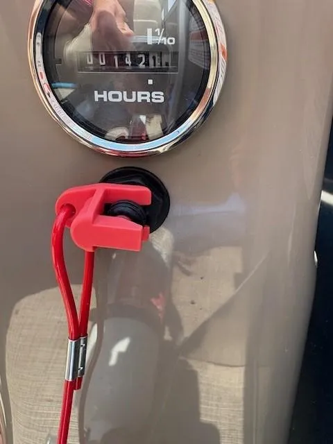 Slide: The Image of Hour meter and safety lanyard on 2022 Sun Tracker Party Barge 22 XP3. - 4