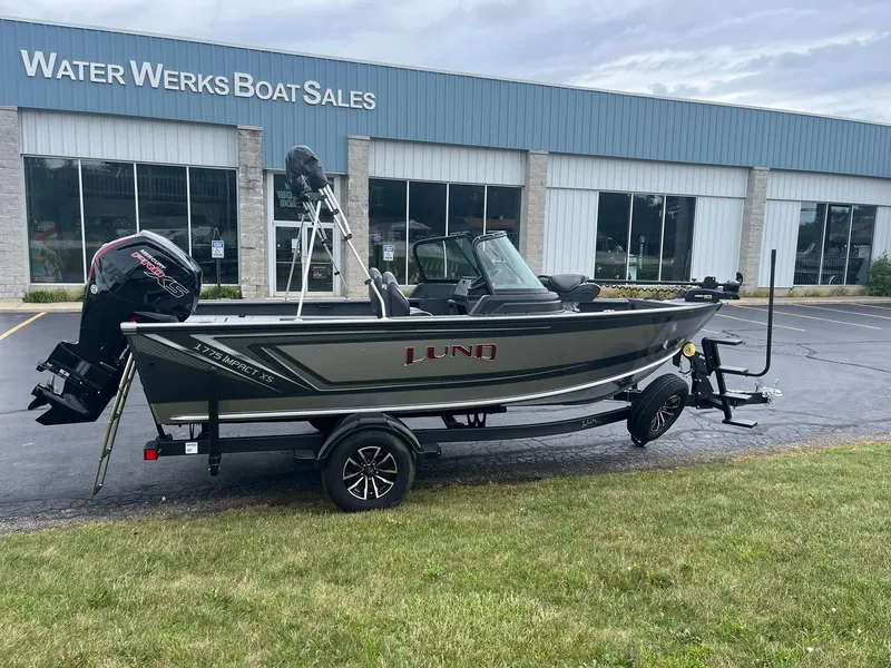 Slide: The Image of 2026 Lund 1775 Impact XS Sport boat at Water Werks Boat Sales dealership. - 1