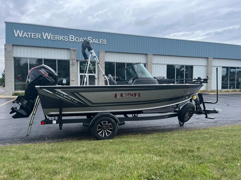 Slide: The Image of 2026 Lund 1775 Impact XS Sport boat at Water Werks Boat Sales dealership. - 2