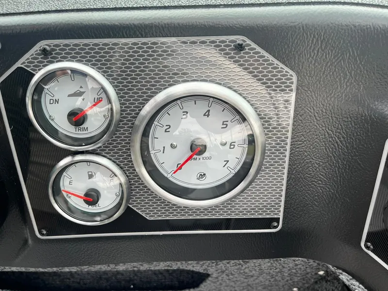 Slide: The Image of Dashboard gauges of 2026 Lund 1775 Impact XS Sport boat. - 26