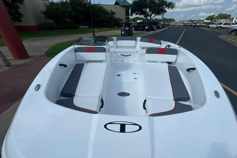 Slide: The Image of 2025 Tahoe T18 boat with sleek white design and comfortable seating. - 65