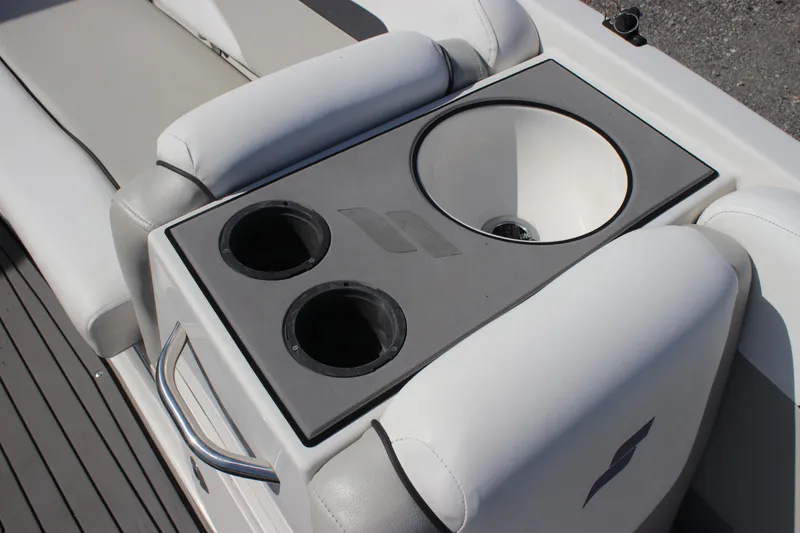 Slide: The Image of 2021 Starcraft SVX 191 OB boat interior with cup holders and sink. - 11